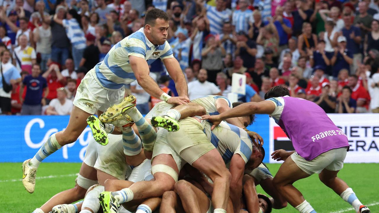 Argentina's players celebrate after scoring their second try during the France 2023 Rugby World Cup quarter-final match between Wales and Argentina