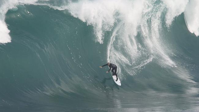 Australian big wave surfer Dylan Longbottom and the wipeout that put him in hospital at a South Australian reef break. Picture: Andrew Brooks