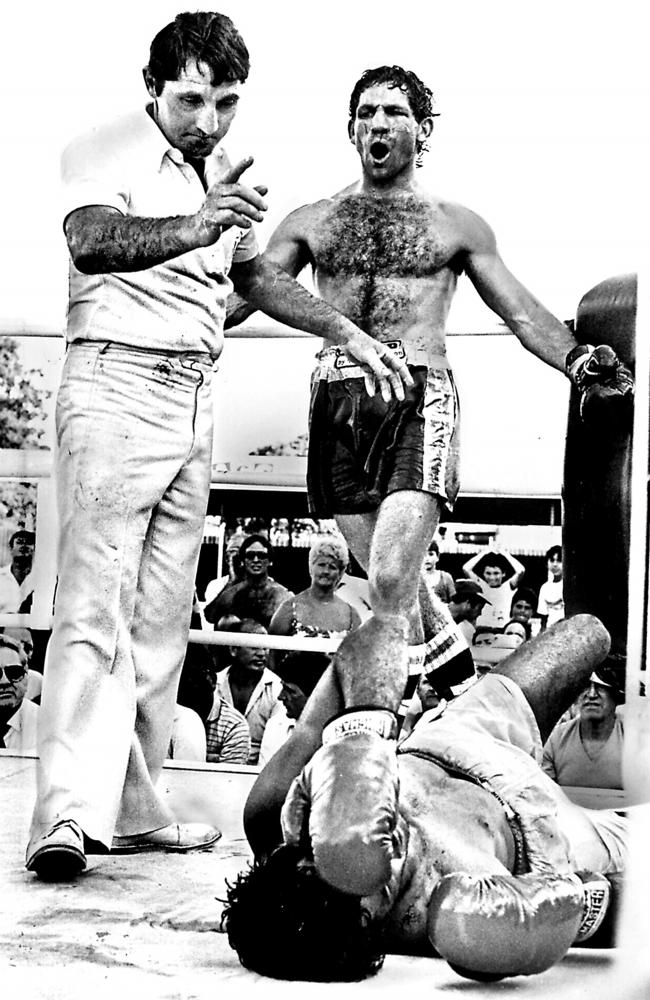 Canterbury player Billy Johnstone knocks down Australian middleweight champion boxer Richie Roberts in 1984.