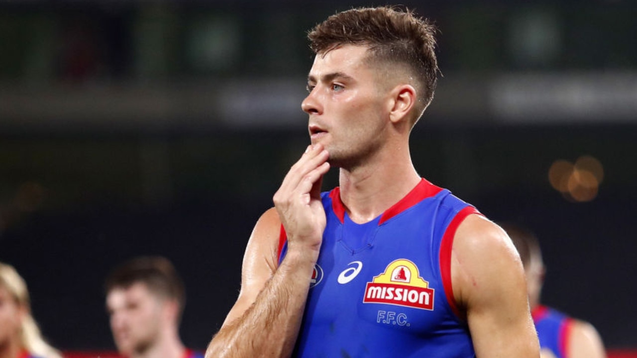 MELBOURNE, AUSTRALIA - MARCH 04: Josh Dunkley of the Bulldogs looks dejected after a loss during the 2022 AFL Community Series match between the Western Bulldogs and the Brisbane Lions at Marvel Stadium on March 4, 2022 In Melbourne, Australia. (Photo by Dylan Burns/AFL Photos via Getty Images)