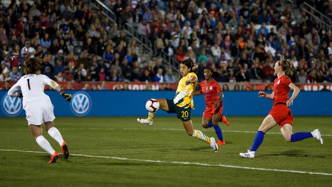 Sam Kerr heads for goal against the US. Picture: AFP