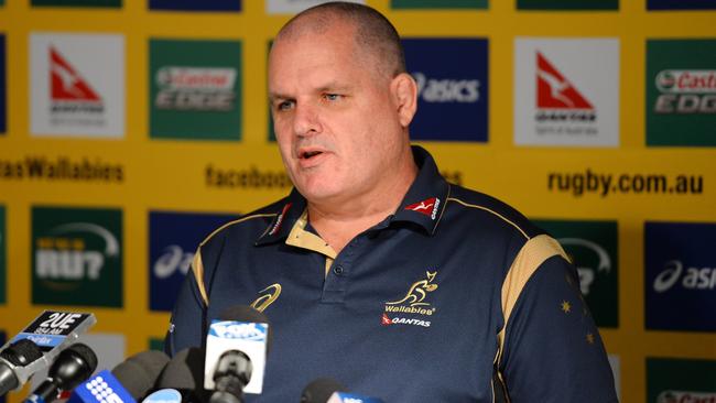 Wallabies coach Ewen McKenzie announces the 32-man squad for Australia’s upcoming three-game test against France at a press conference in Sydney on May 22, 2014. Australia will play France in the 2014 Castrol EDGE France Tour in Brisbane on June 7, Melbourne on June 14 and Sydney on June 21. AFP PHOTO/Peter PARKS