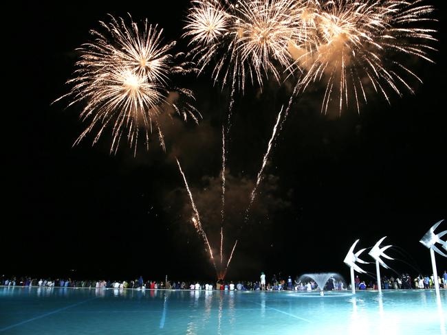 Fireworks light up the sky on New Year's Eve over the Cairns Esplanade lagoon. Picture: Brendan Radke