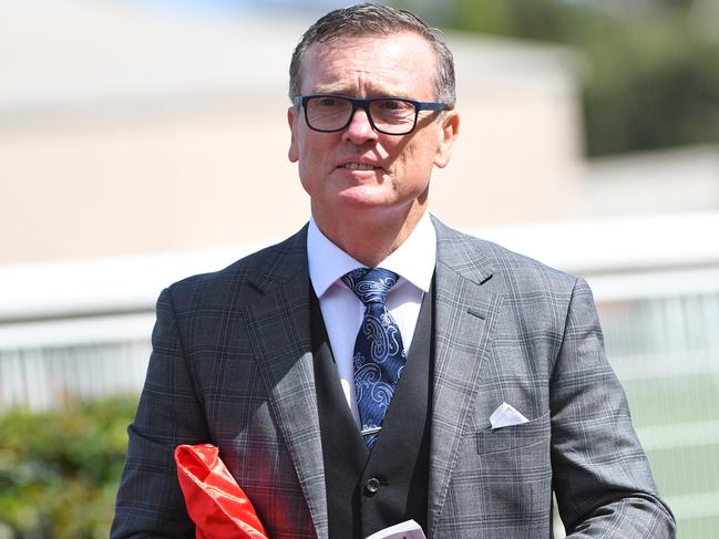 Trainer of Alligator Blood, David Vandyke is seen arriving during the 2020 All-Star Mile at Caulfield Racecourse in Melbourne, Saturday, March 14, 2020. (AAP Image/Vince Caligiuri) NO ARCHIVING, EDITORIAL USE ONLY