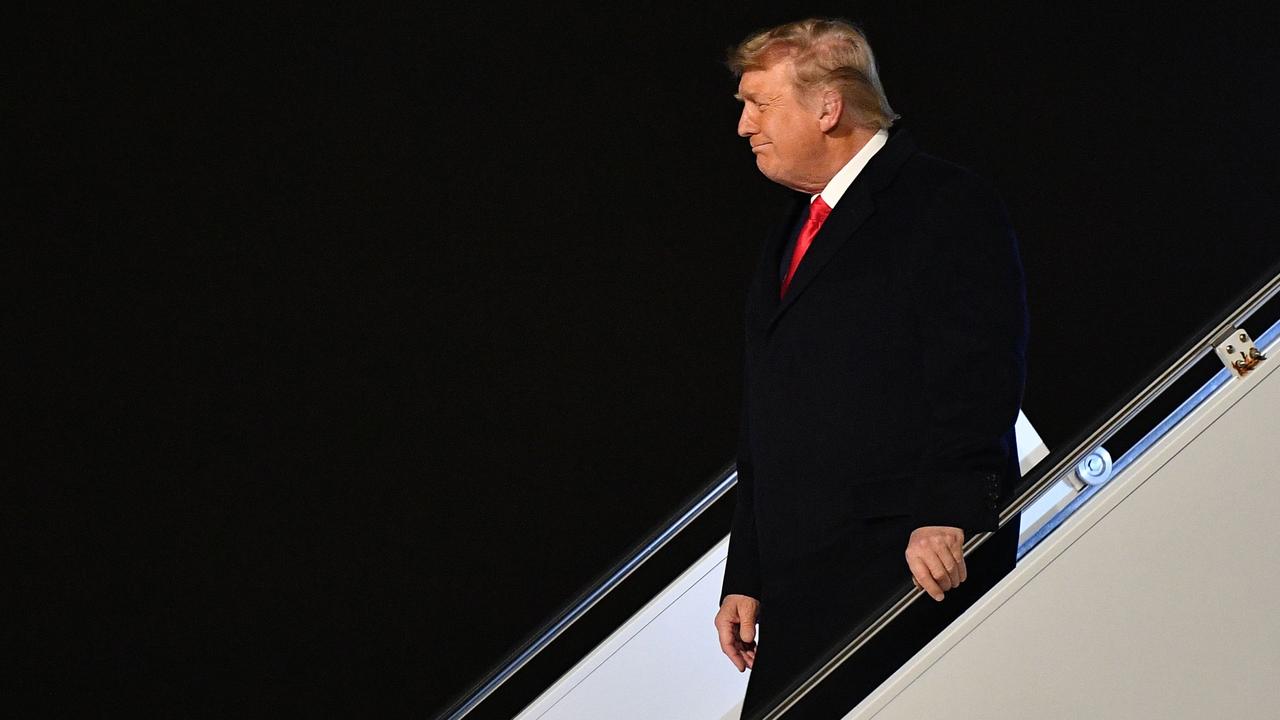 Donald Trump disembarking Air Force One to take the stage in Marietta, Georgia on Monday evening. Picture: Mandel Ngan/AFP