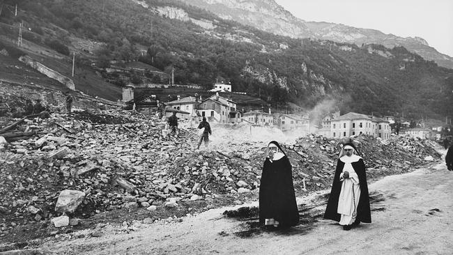 Vajont disaster. Nuns in the village. Rescuers searching among the ruins. Longarone, 11th October 1963 ( Photo by Sergio del Grande/Mondadori via Getty Images)