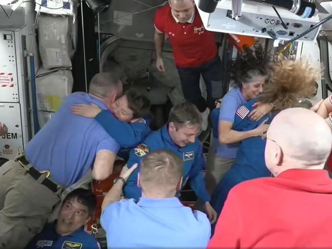 SpaceX Dragon Crew-10 members greeting International Space Station crew members including NASA astronauts Butch Wilmore (L) and Suni Williams (3R). Picture: NASA / AFP