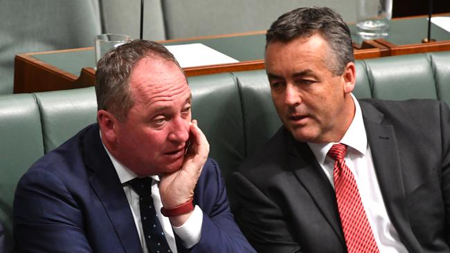 Deputy Prime Minister Barnaby Joyce and Minister for Infrastructure Darren Chester during Question Time in the House of Representatives at Parliament House in Canberra, Tuesday, October 24, 2017. (AAP Image/Mick Tsikas) NO ARCHIVING