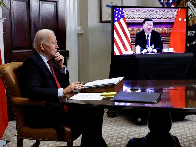 Joe Biden and Xi Jinping talk during their virtual summit last week. Picture: Reuters