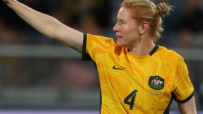 GEELONG, AUSTRALIA - DECEMBER 07: Clare Polkinghorne of Australia acknowledges the crowd after been substituted in her final match during the International Friendly Match between the Australia Matildas and Chinese Taipei at GMHBA Stadium on December 07, 2024 in Geelong, Australia. (Photo by Morgan Hancock/Getty Images)