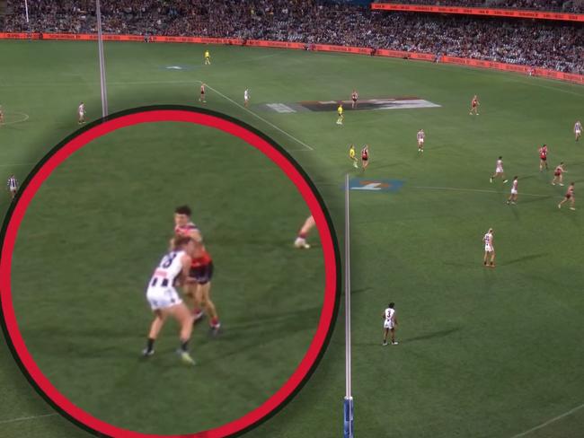 The hit was caught on camera away from the action. Photo: Fox Footy.