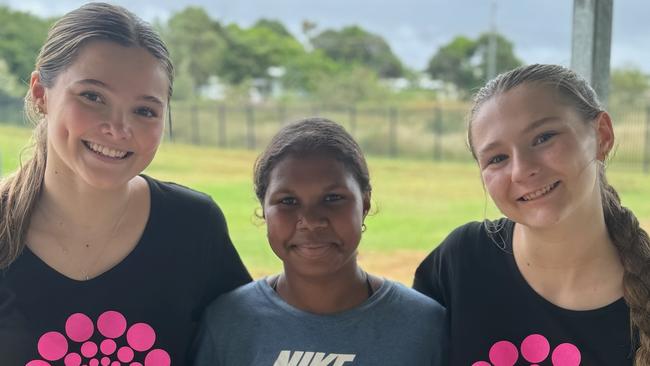 Australian Girls Choir member Brooklyn Cate, Lockhart River State School Student Quintezzah Dorman and Australian Girls Choir member Jacinta Ellis took part in a Reverse Travel cultural exchange program facilitated by not-for-profit organisation Girls From Oz. Photo: Kylie Lee-Archer.