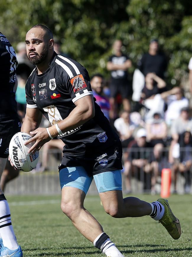 Redfern's Kieran Vale looks to pass. Picture: John Appleyard