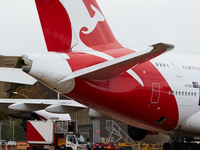 A Qantas plane is seen at Sydney Airport in Sydney, Friday, June 1, 2018. (AAP Image/Erik Anderson) NO ARCHIVING