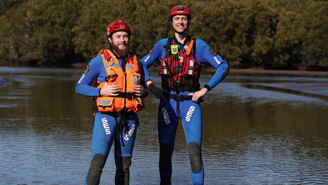 SES volunteers John Tearle, 25, and Steffen Broxtermann, 32, are water flood rescue technicians who were called into action on Sunday July 26, 2020 when a bus got stuck in flood water along University Drive in Newcastle and passengers and driver needed to be rescued. Picture: David Swift