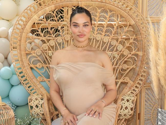 July 24 2022NON EXCLUSIVEInside Shanina ShaikÃ¢â¬â¢s star studded baby shower.Shanina Shaik looks stunning as she puts her blossoming baby bump on display celebrating her baby shower with friends and family. The Australian supermodel treated her star studded guests to lavish celebration at a beautiful house in the Hollywood Hills.Best friends Georgia Sinclair and Nicole Williams English put much effort in to arranging the beautiful event.Jasmine Tookes, Josephine Skriver, Sara Sampaio, Nicole Williams English, Georgia Sinclair, Olivia Pierson, Georgie Flores were among the starÃ¢â¬â¢s friends attending the celebrations.ShaninaÃ¢â¬â¢s mother also attended the event along with boyfriend Matthew and his mother.The guests enjoyed lunch in a beautiful setting followed by a Ã¢â¬Ëcute mom or dadÃ¢â¬â¢ quiz and guessed the supermodelÃ¢â¬â¢s baby bump size in a fun competition. The party also had a tarot card reader present along with an adorable stuffie teddy bear station where guests could build their on stuffed animals.Guests were seen leaving with Kora Organics gift bags, a brand founded by ShaninaÃ¢â¬â¢s supermodel friend Miranda Kerr.Los Angeles, CAÃ¢âÂ¸Babak RachpootBYLINE MUST READ: RACHPOOT.COM