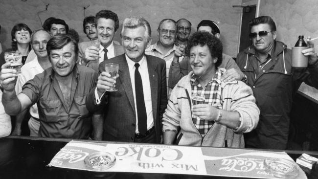 Former PM Bob Hawke picks up the tab during a visit to the Colac Hotel in Port Adelaide in 1984.