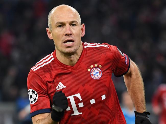 Bayern Munich's Dutch midfielder Arjen Robben celebrates scoring the opening goal during the UEFA Champions League Group E football match Bayern Munich vs Benfica Lisbon in Munich, southern Germany, on November 27, 2018. (Photo by Sven Hoppe / dpa / AFP) / Germany OUT
