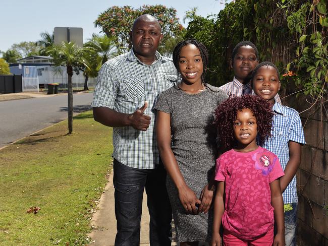 Congo migrants Edouard Ndjamba Ndjoku, Grace (15) Marc (10)Jonathan (8) and Daniella (5) pose for a photo near their home in Rapid Creek on Tuesday, October 9, 2018. The government is encouraging migrants to move to regional areas like Darwin. Picture: Keri Megelus