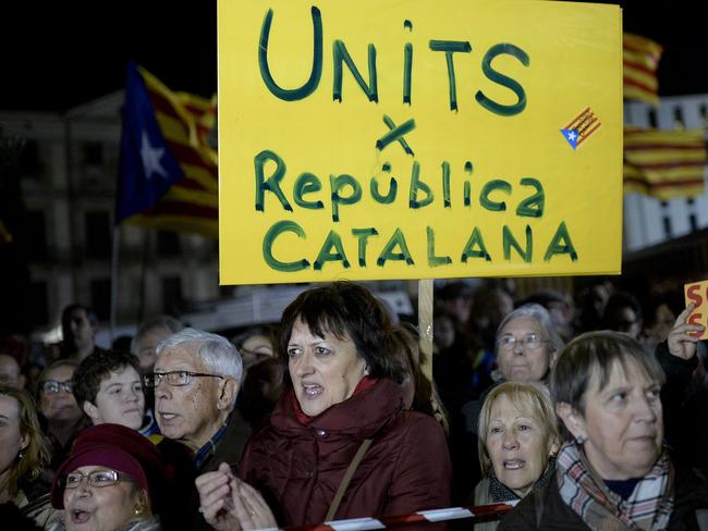 Want independence ... Demonstrators hold placards reading in Catalan "United for a Catalan Republic" during a demonstration called by the Catalan National Assembly (ANC) demanding an agreement between secessionist parties in Barcelona.  Picture:  AFP