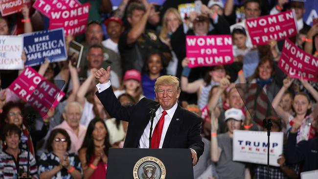 Sure, love Trump if you wish but make sure you still hold him accountable. He has been afforded a fair bit of power, after all. (Pic: Alex Wong/Getty Images/AFP)