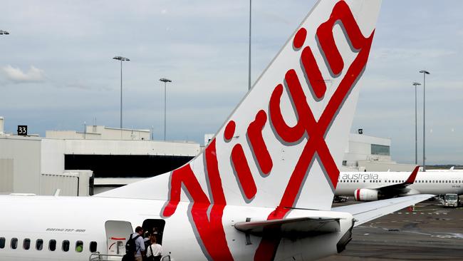 Three men sparked chaos on a flight to Bali on Friday, after allegedly becoming drunk on board. Picture: NCA NewsWire / Nicholas Eagar