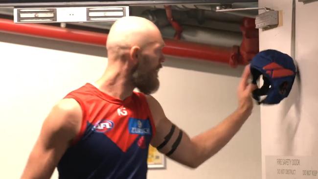 Max Gawn taps Angus Brayshaw's helmet in tribute to the retired Demon.