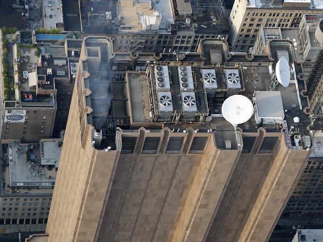 Communications and ventilation equipment stand atop the former AT&T Long Lines Building at 33 Thomas Street in this aerial photo taken over New York, U.S., on Wednesday, July 7, 2010. New York City, the third-largest U.S. municipal borrower, may face budget shortfalls as large as $5.1 billion next year, Comptroller Thomas DiNapoli said. Photographer: Keyur Khamar/Bloomberg via Getty Images