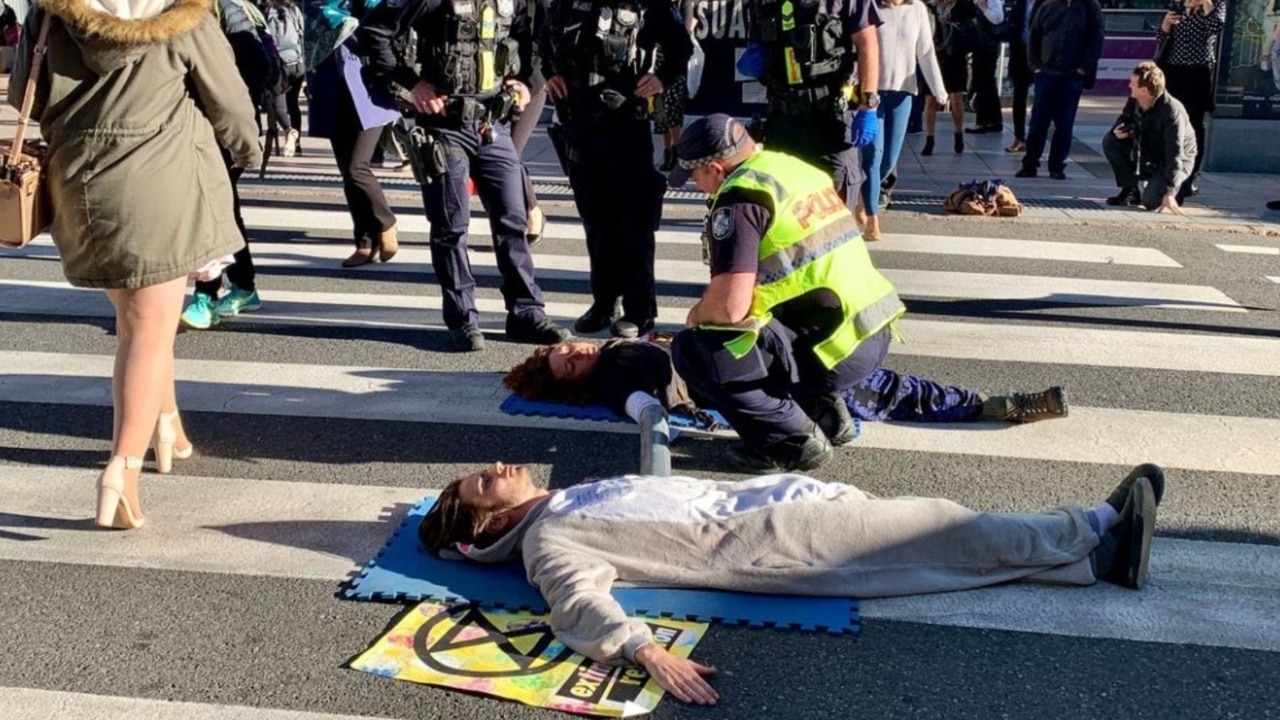 Seven arrested over Adani protest in Brisbane 