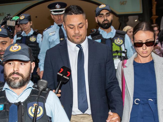 SYDNEY, AUSTRALIA - NCA Newswire Photos - APRIL 06, 2023: Jarryd Hayne (C) leaves the Downing Centre holding his wife's hand Amellia Bonnici in Sydney this afternoon. Picture: NCA Newswire / Christian Gilles