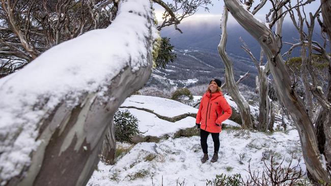 Eleanor Gilkes hikes through snow-covered gums at Thredbo. Picture: Supplied