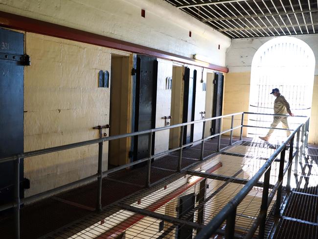 PARRAMATTA ADVERTISER/AAP. Site Officer Peter Brown inspects the upper levels of Wing 6 for anything out of place at the Old Parramatta Gaol in North Parramatta. North Parramatta, Friday 31 May, 2019. Feature on Old Parramatta Gaol. Deerubbin Land Council CEO Stephen Wright at the wing of the old gaol where he's encountered some paranormal activities. (AAP IMAGE / Angelo Velardo)