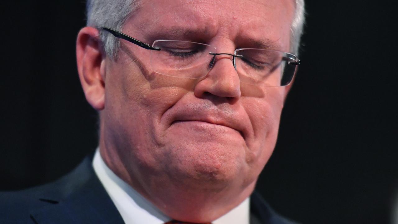 Pictured: Scott Morrison failing to escape the facts. Mick Tsikas/AAP