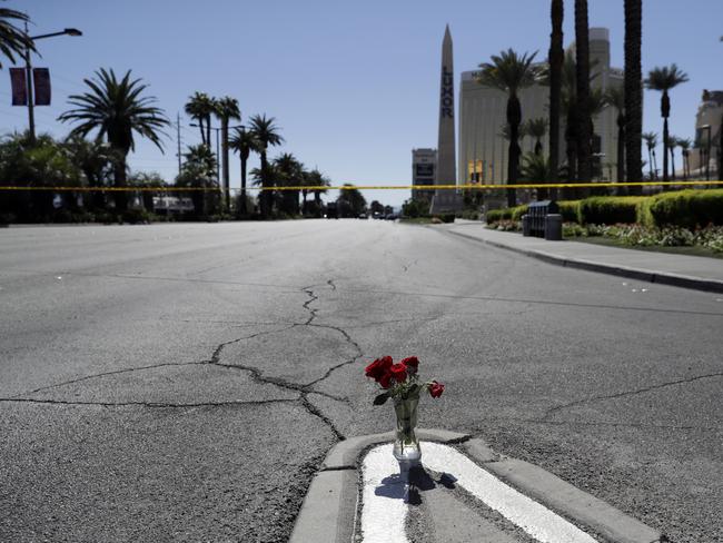 Flowers are placed near the scene of the shooting. Picture: AP