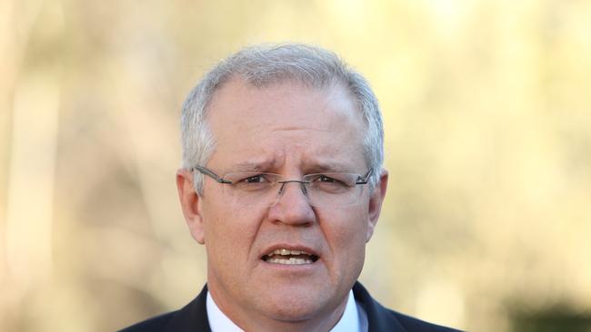 PM Scott Morrison visiting Louise Josephs home in Canberra with with Minister for Indigenous Health, Senior Australians and Aged Care Ken Wyatt , Assistant Minister for Treasury and Finance Senator Zed Seselja. Picture Kym Smith