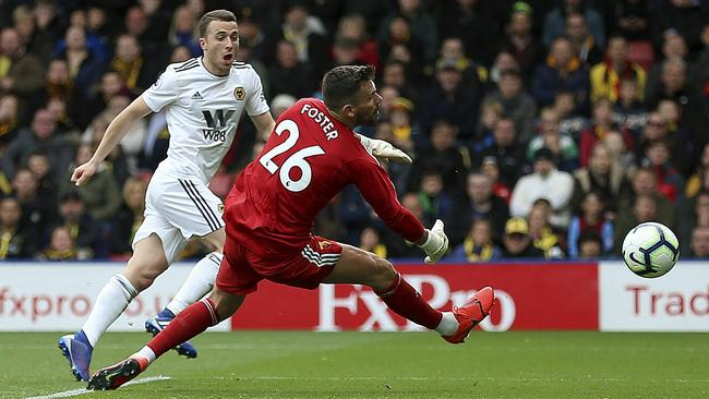 Wolverhampton’s Diogo Jota beats Watford keeper Ben Foster. Picture: PA via AP)