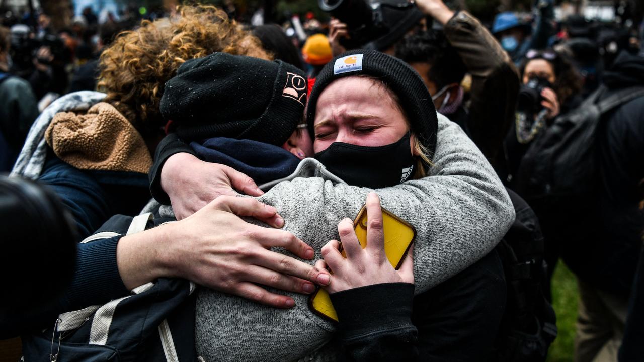 And hugs. Picture: Chandan Khanna/AFP