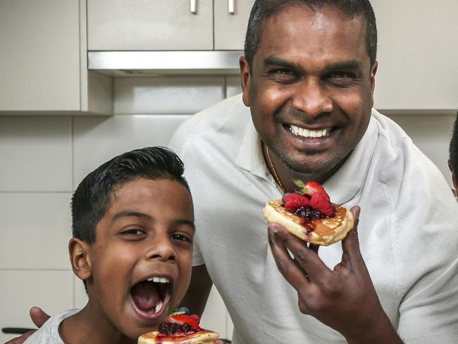 SA Masterchef contestant Sashi in the kitchen at home with his children Ryan 10 and Marcus 12 Sunday July 8, 2018 - pic AAP/MIKE BURTON