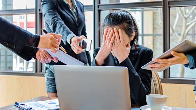 RendezView. Female office worker with too many tasks to take at the same time. (Pic: iStock)