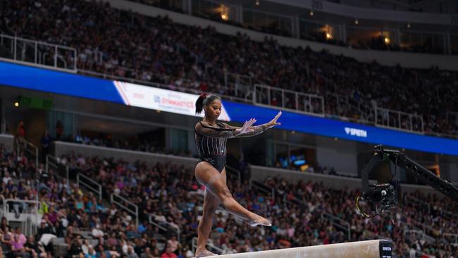 Gymnastics continues to be one of the country’s most popular sports for young people. Picture: Loren Elliott / AFP
