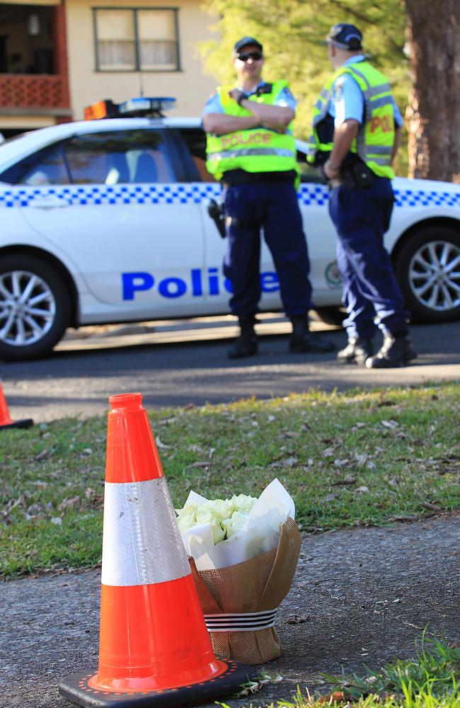 Flowers were left near the home in West Pennant Hills. Picture: Danny Aarons