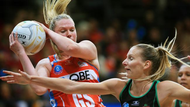 Caitlin Thwaites and April Letton in action during a Swifts v Fever match