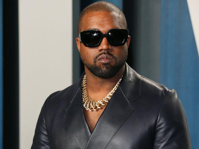 (FILES) In this file photo taken on February 9, 2020 Kanye West attends the 2020 Vanity Fair Oscar Party following the 92nd annual Oscars at The Wallis Annenberg Center for the Performing Arts in Beverly Hills. - US rapper and apparent presidential candidate Kanye West has in the past opened up about his struggles with bipolar disorder. But his recent erratic behavior has again called into question his health and treatment. He launched his election campaign on July 19, 2020 with a rambling speech that saw him rant incoherently, reveal he had wanted to abort his daughter, and break down in tears. (Photo by Jean-Baptiste Lacroix / AFP)