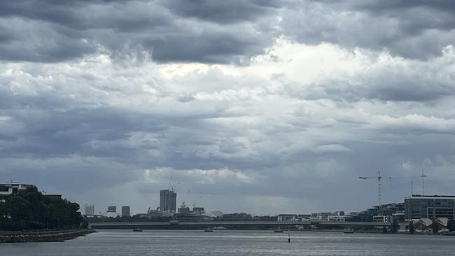 Dark clouds merging over Accor Stadium shortly before Taylor Swift's first concert. Picture: NCA NewsWire