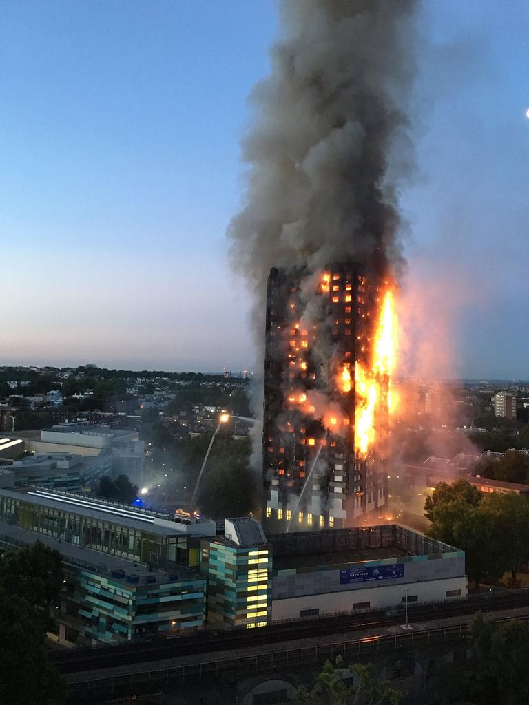 Flames and smoke coming from a 27-storey block of flats which is fully alight. The fire brigade said 40 fire engines and 200 firefighters battled the blaze. Picture: AFP Photo/Natalie Oxford