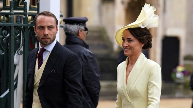 Pippa Middleton, the sister of Princess Catherine, arrives with brother James. Picture: Getty Images