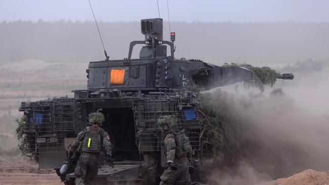 German soldiers with a Puma infantry fighting during NATO exercises in Lithuania in April. Picture: Sean Gallup/Getty Images