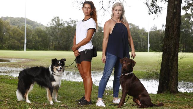 Jess van der Meer and her dog Wally and Karen Griffin with her dog Cuba at Careel Bay dog park at Avalon. Picture: Richard Dobson