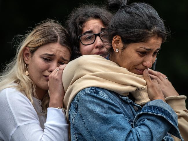 Mourners weep at a student vigil near Al Noor mosque in Christchurch. Picture: Getty