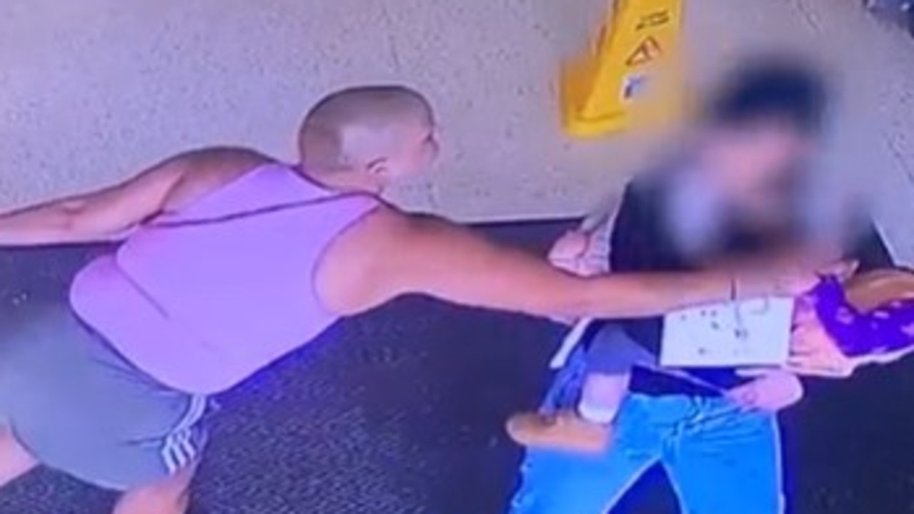 The moment a woman allegeldy attacked a baby in a woman's arms. Picture: Supplied/WA Police